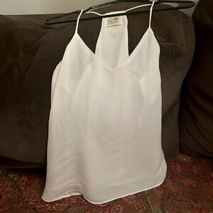 Never worn, beautiful, white, strapping and thin. Perfect for Summer.